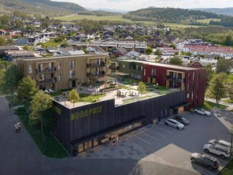 Gimsetoppen – Bunnprisbutikk og leiligheter