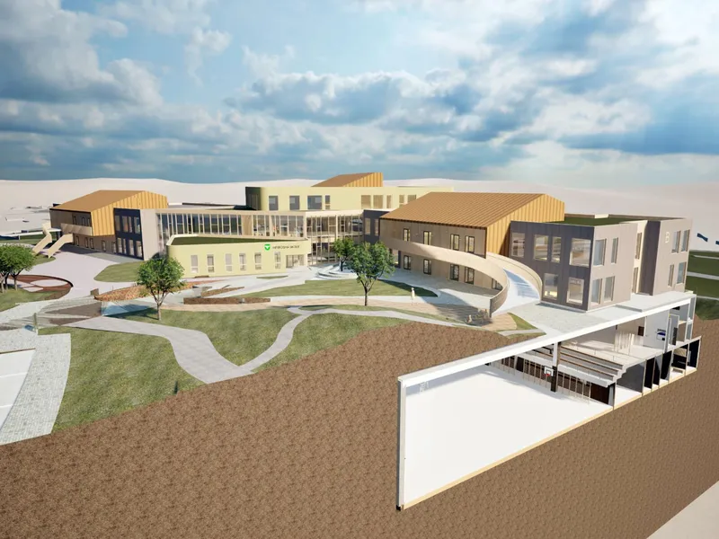Nye Hommersåk skole vil få plass til fem paralleller og en idrettshall under bakken. Sandnes kommune skal også bygge ny skole på Trones de nærmeste årene.. Illustrasjon: Link Arkitektur