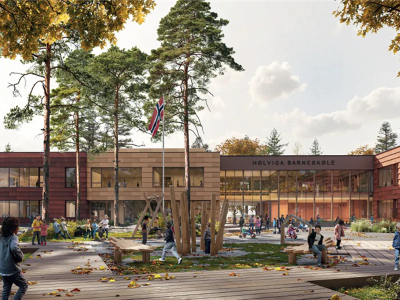 Et stort skolebygg sett fra skogssiden,  mange barn i skolegården - Klikk for stort bilde